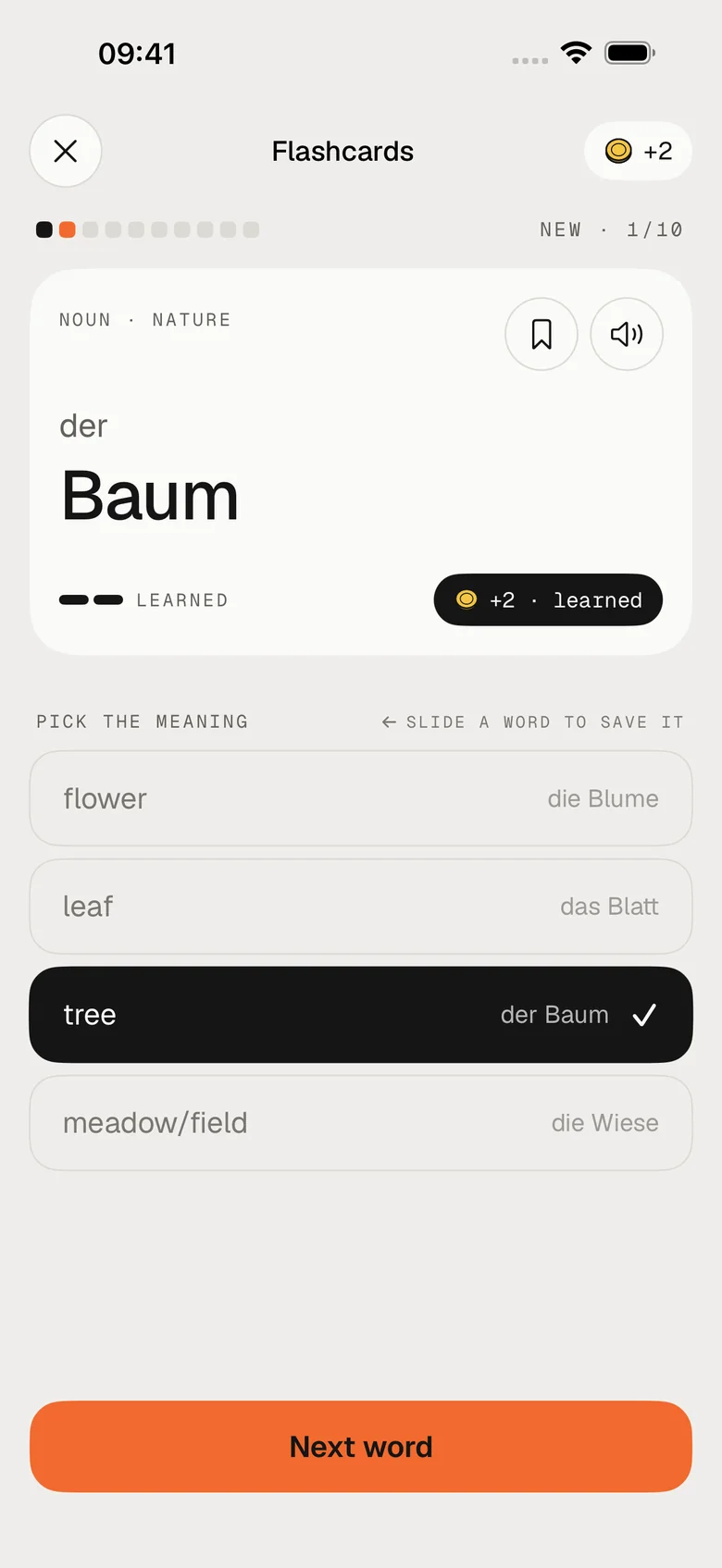 The Flashcards practice: the German word “der Baum” with four meanings to pick from; “tree” is picked and marked right.